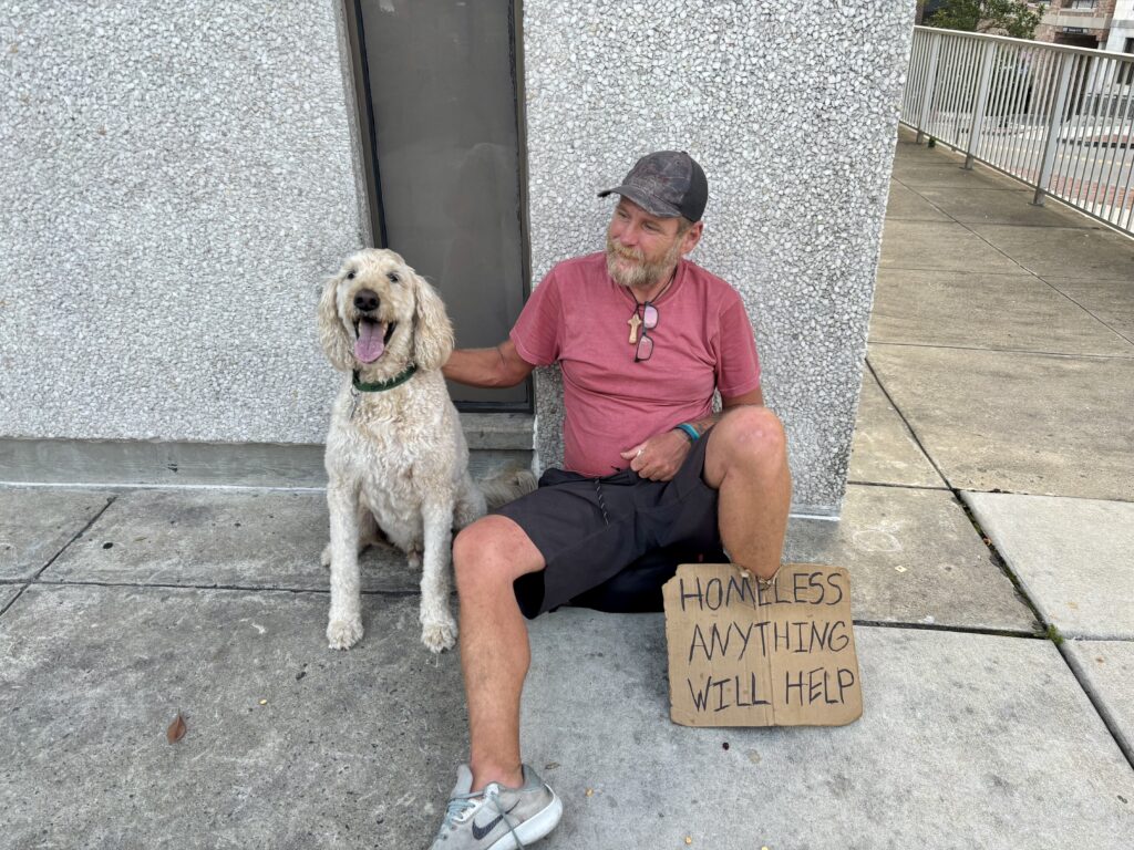 Homeless man with Cosmos
