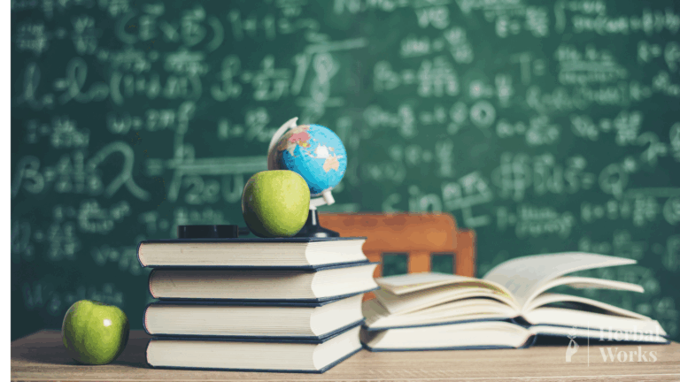 Chalkboard with stacked books in front, symbolizing CBD education and learning