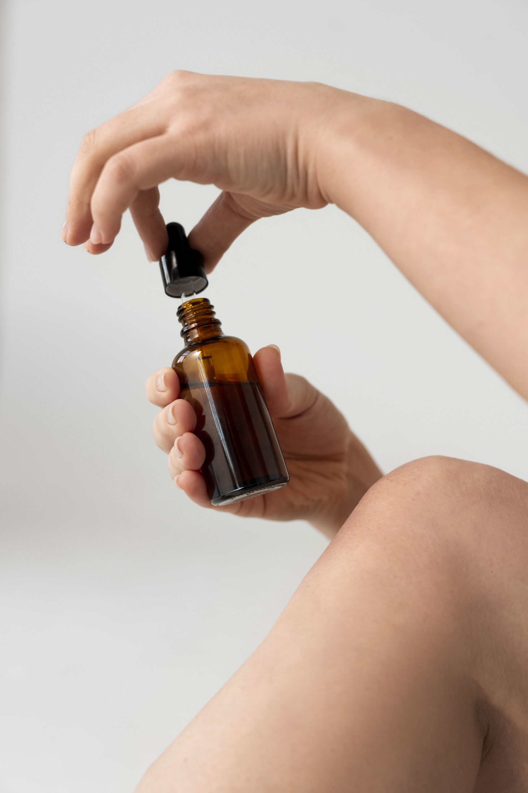 Woman taking tincture